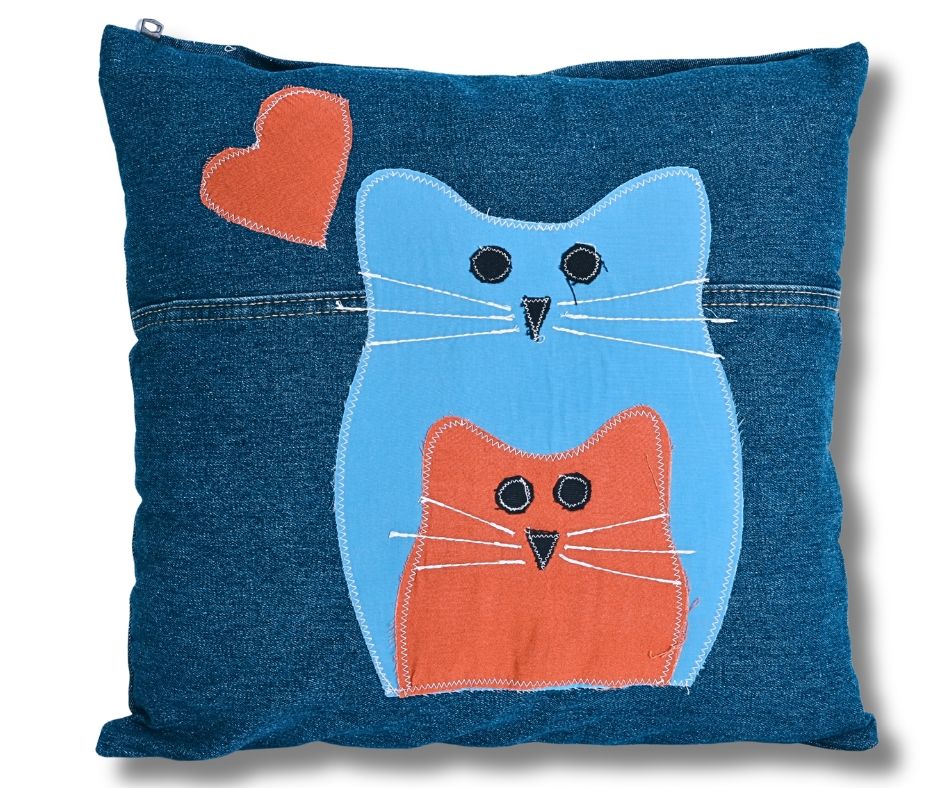 Recycled denim cushion with appliqued cat